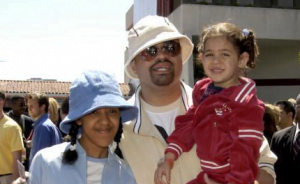 Heavy D with his niece and his daughter Xea in his arms 