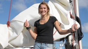 Laura Dekker with her boat 'Guppy' Laura Dekker with her boat 'Guppy'